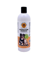 Bottle of 'Signature Shampoo' with a dog and cat on the label against a white background