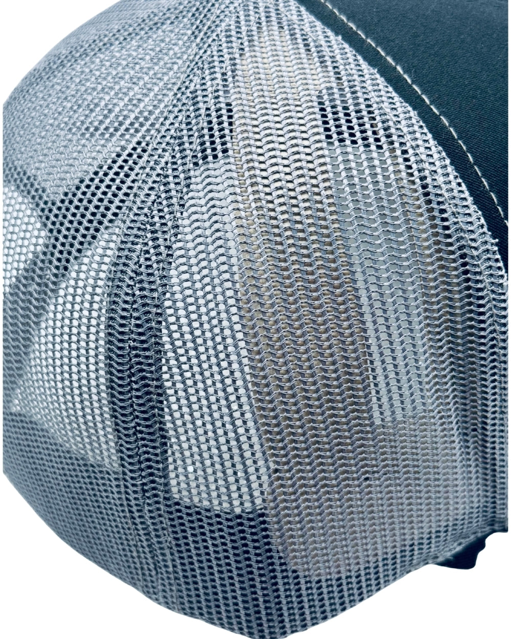 Close-up of a blue mesh cap with a white interior
