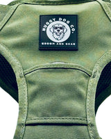 Green dog harness with a Nuggy Dog Co. label on a white background