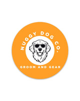 Nuggy Dog Co. logo with a dog illustration on an orange circle background