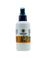 White spray bottle with a label on a white background