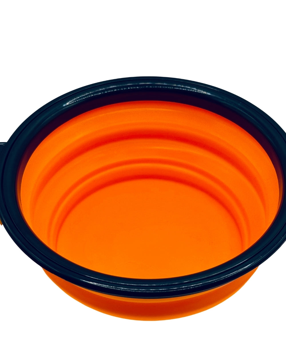 Open Trail Bowl ready for use, food-grade silicone pet travel bowl in orange.